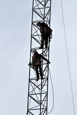 Two Construction Workers Working on the Yonkers Tower