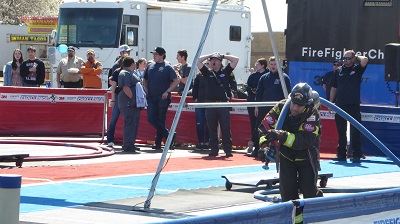 Blue Team Firefighter Pulls the Hose