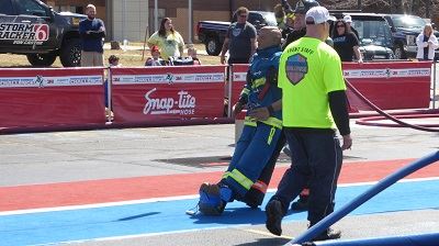 Blue Team Firefighter Hauling a Rescue Dummy 1